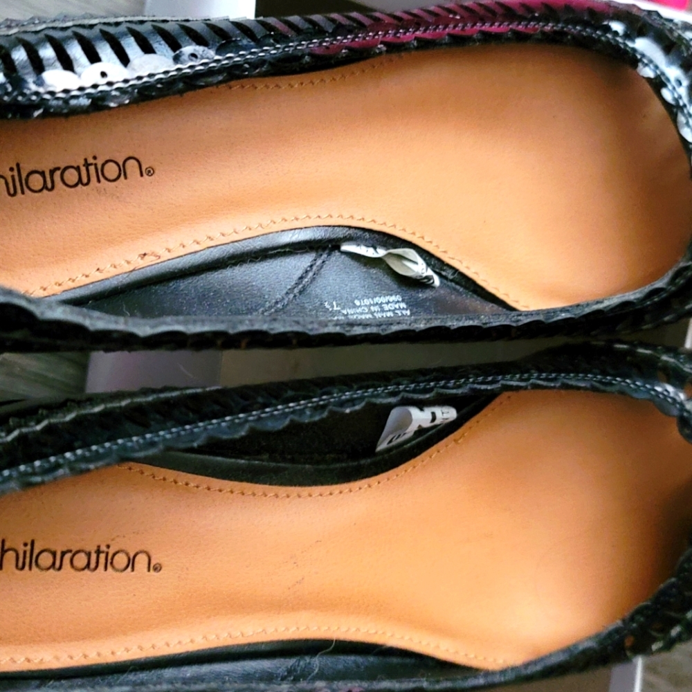 Xhiliration size 7